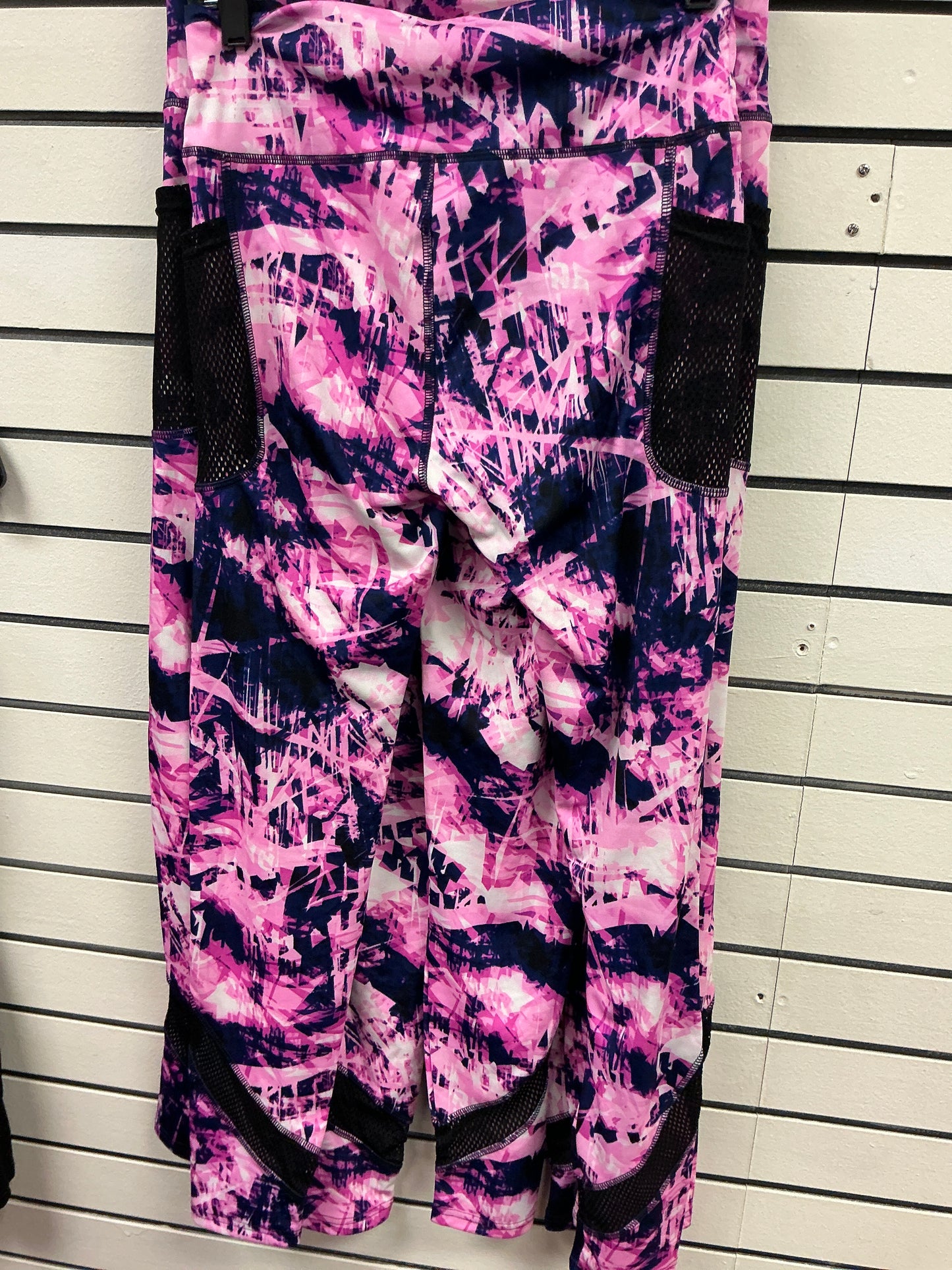 Pink and purple spandex, pants out and white
