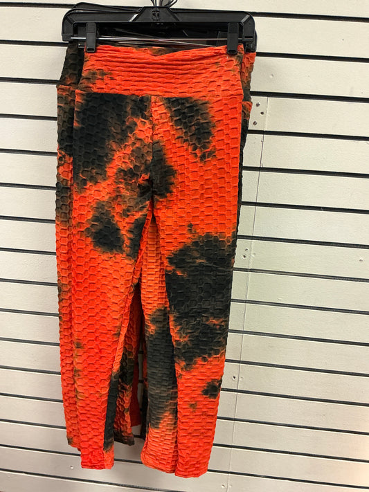 Hot, orange spandex, pants, black tie-dye